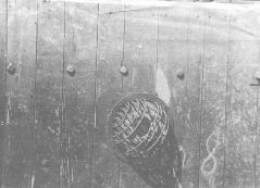 Gas chamber door: close-up on protective grid in the inner side